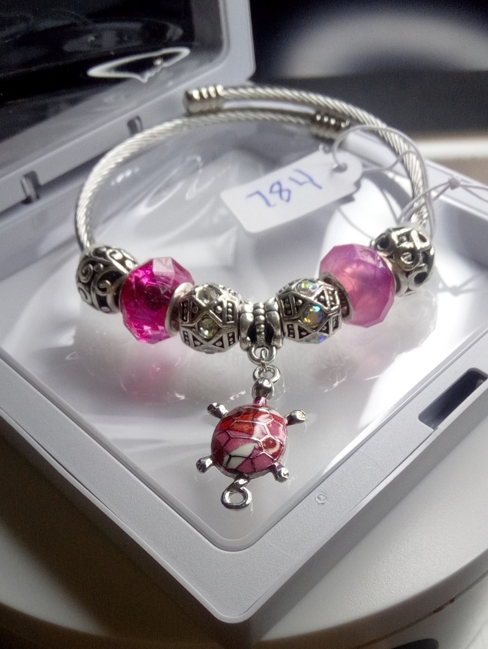 Silver-Tone Bracelet with Pink Beads and Turtle Charm
